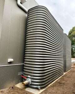 Large grey water tank installation by Bay Plumbing and Drainage in Geelong for sustainable water management.