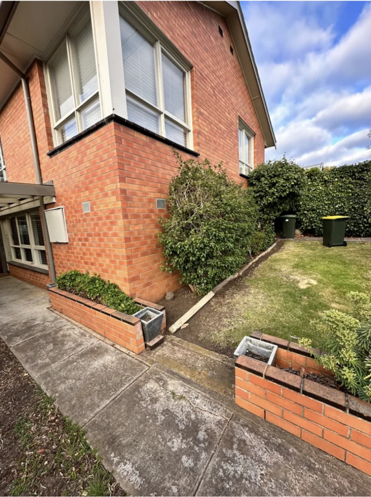 Residential building in Geelong serviced by Bay Plumbing and Drainage, showcasing well-maintained exteriors and landscaping.