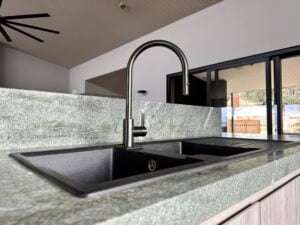 Stylish kitchen sink and modern faucet installed by Bay Plumbing and Drainage in a Geelong home.