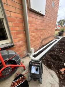 Outdoor plumbing setup with new piping and professional tools by Bay Plumbing and Drainage in Geelong.